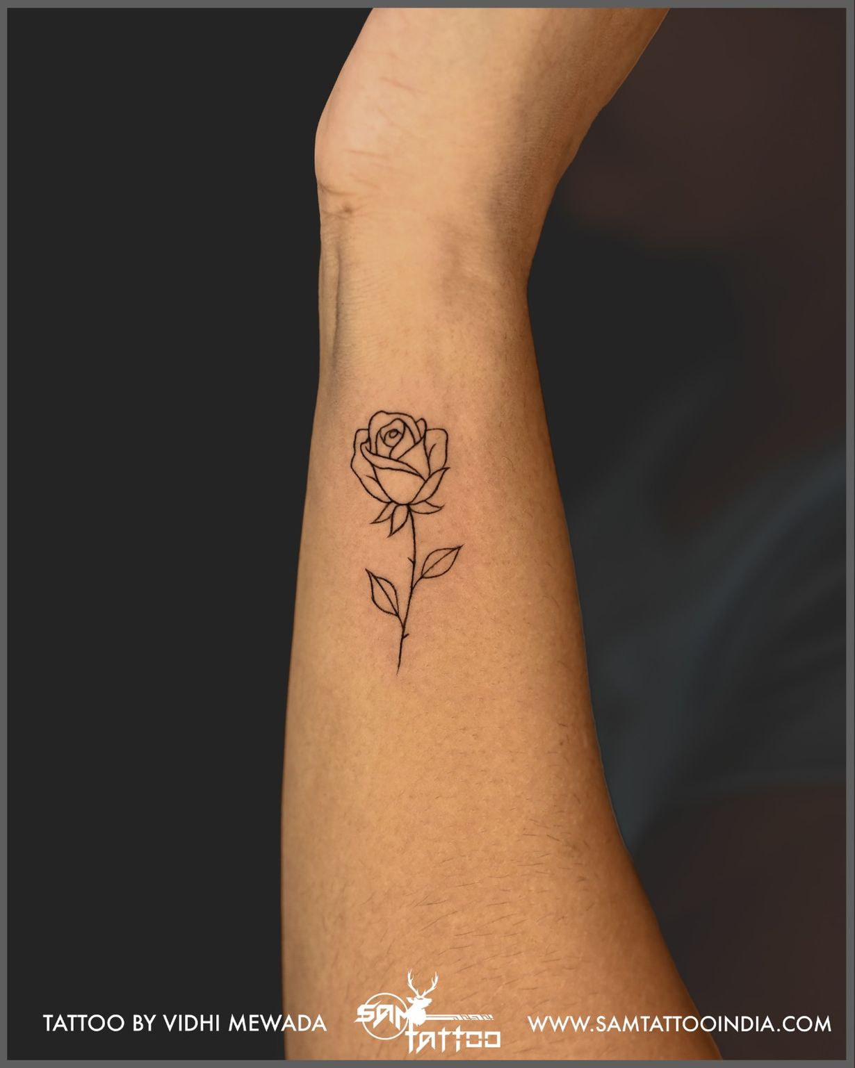 Minimal rose tattoo